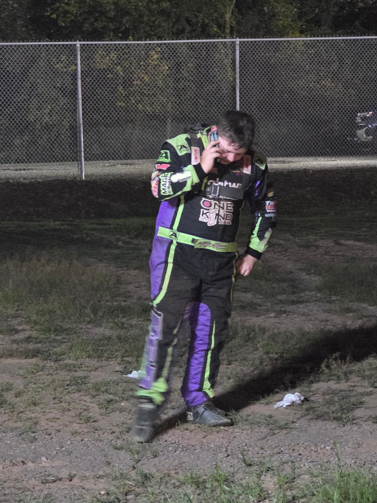 Ryan Johnston in his racing suit trackside after a 2026 feature