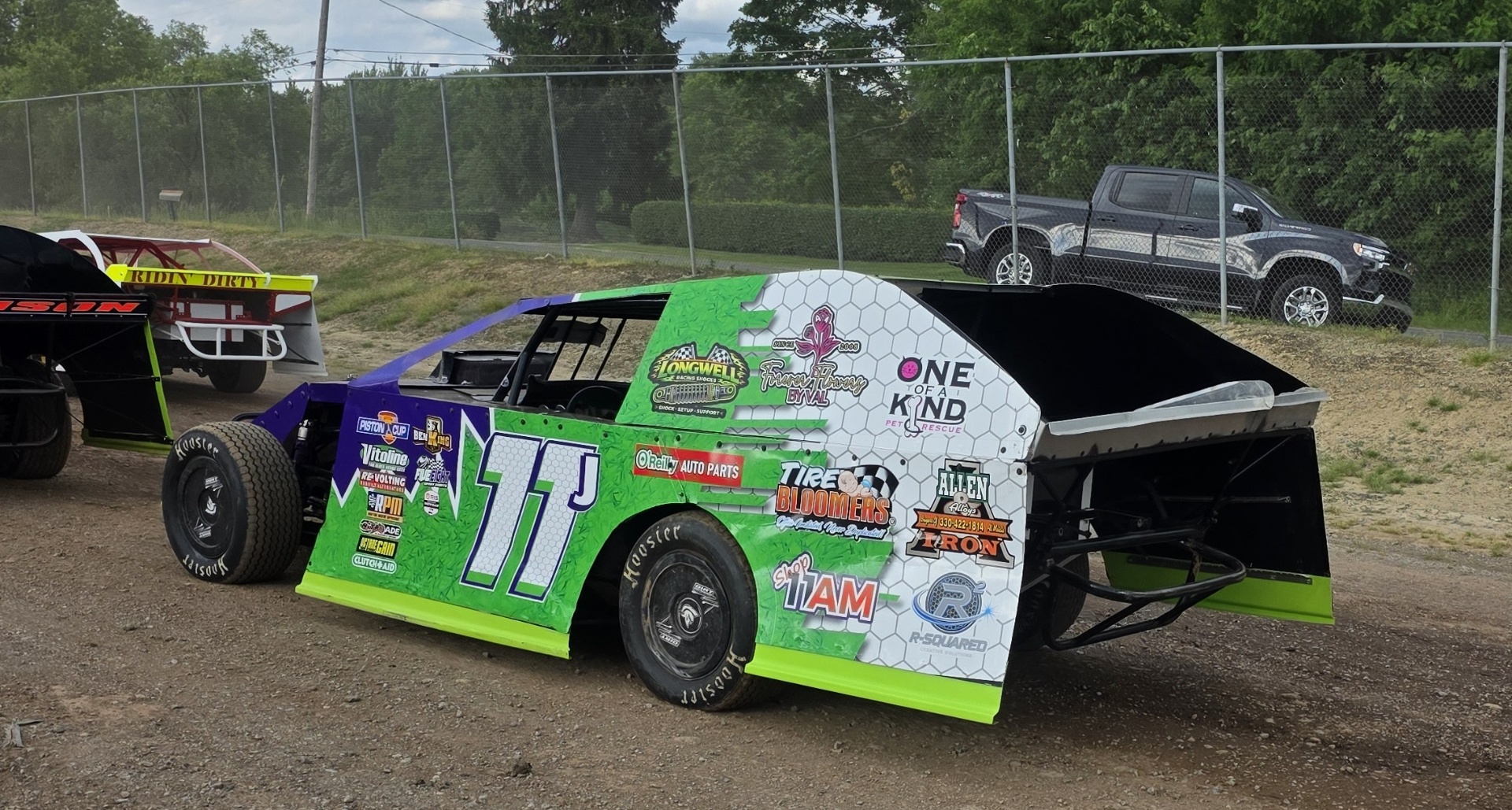R&R Racing #11 EconoMod rear view with sponsor decals in the pits 2026