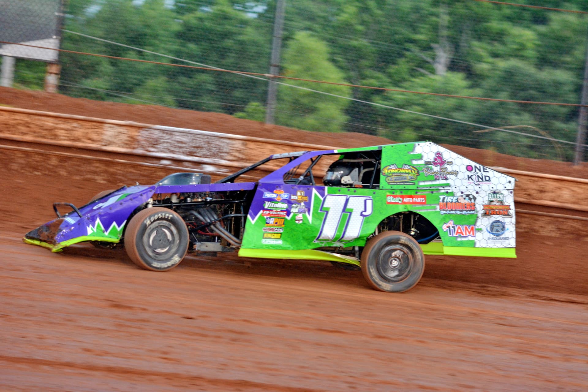 Ryan Johnston #11 EconoMod at speed on the dirt in 2026