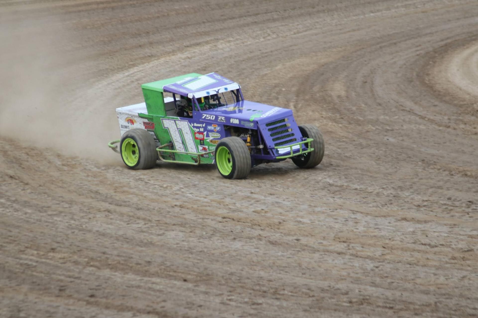 R&R Racing #11 EconoMod kicking up dust through turn on Ohio dirt oval