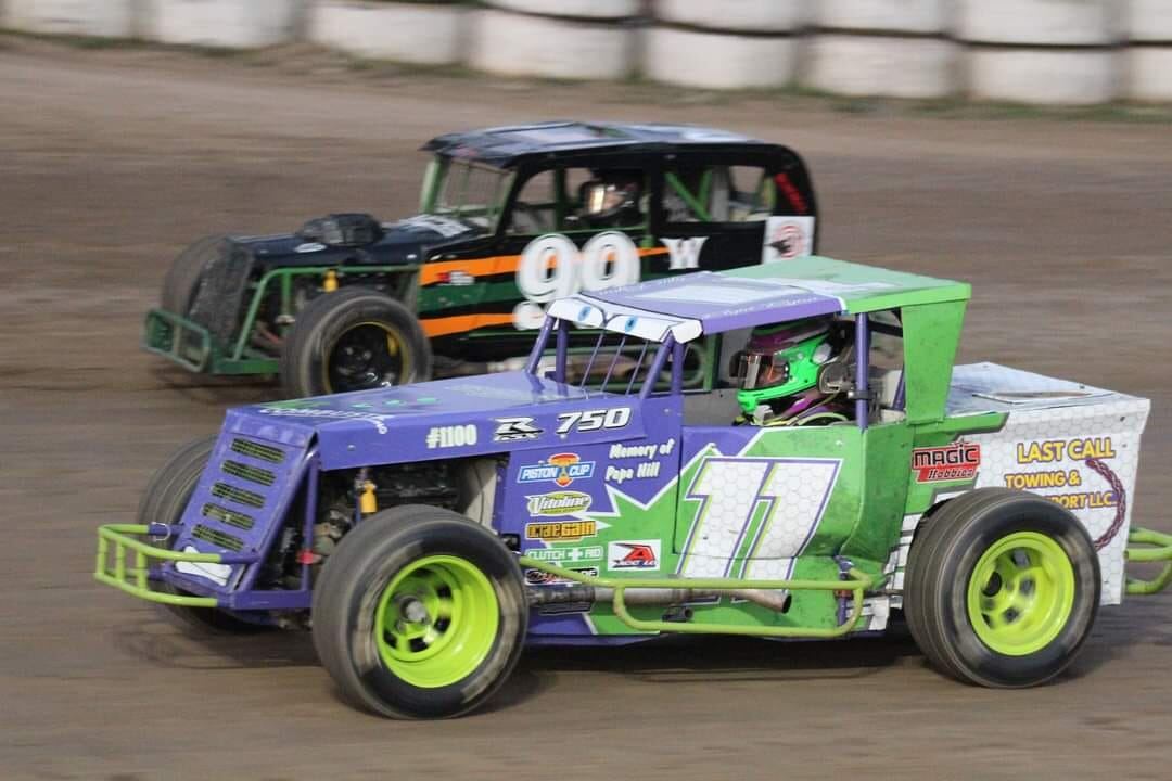 R&R Racing #11 EconoMod battling competitor on dirt track straightaway