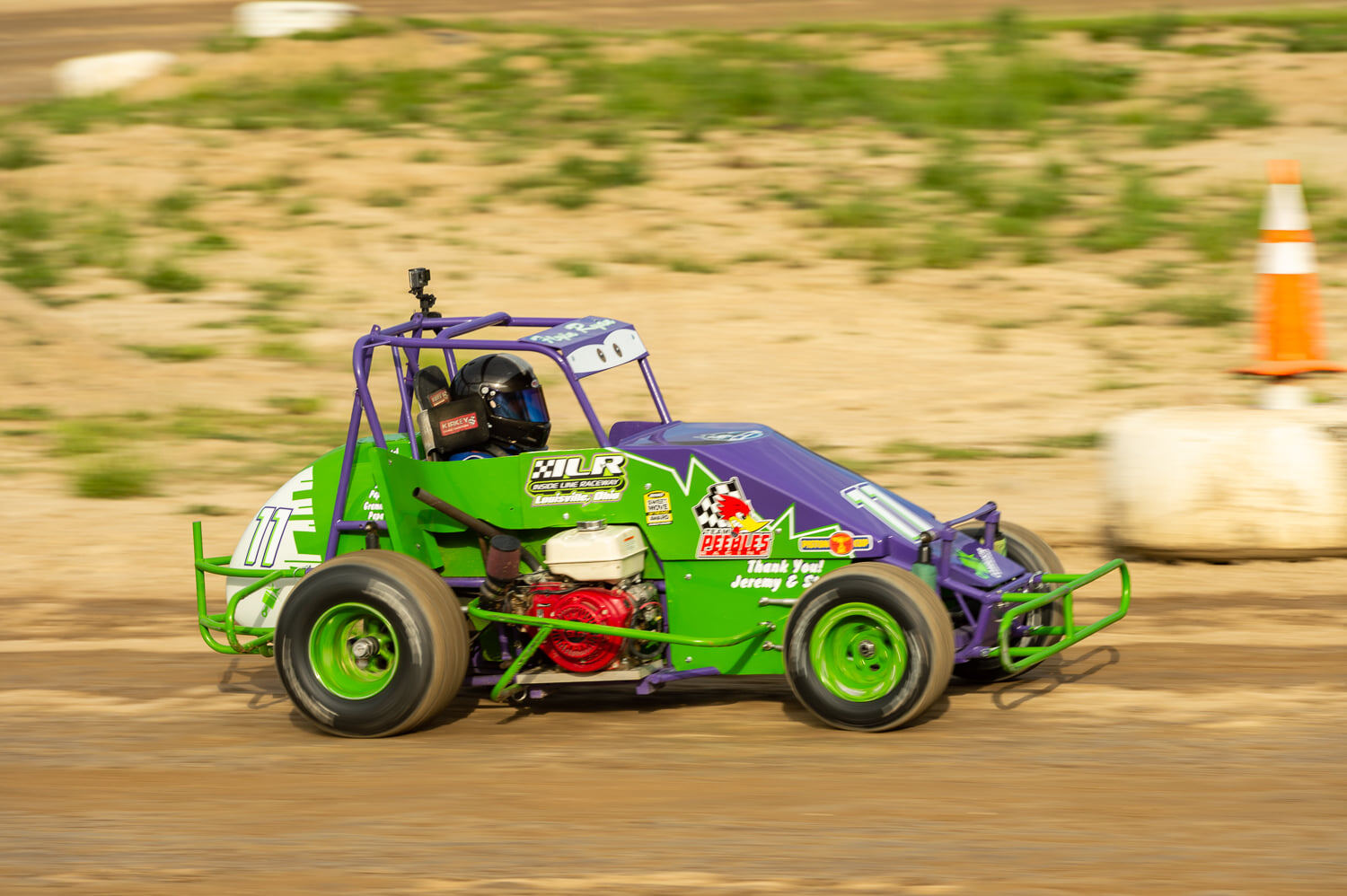 R&R Racing #11 EconoMod racing at speed with motion blur on Ohio dirt track