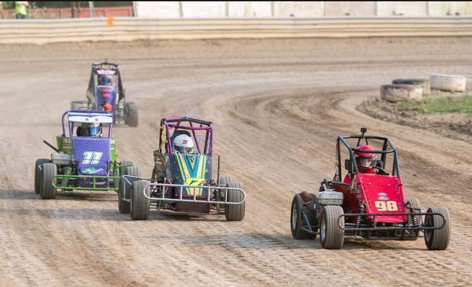Ryan Johnston EconoMod racing in pack of cars on Ohio dirt oval