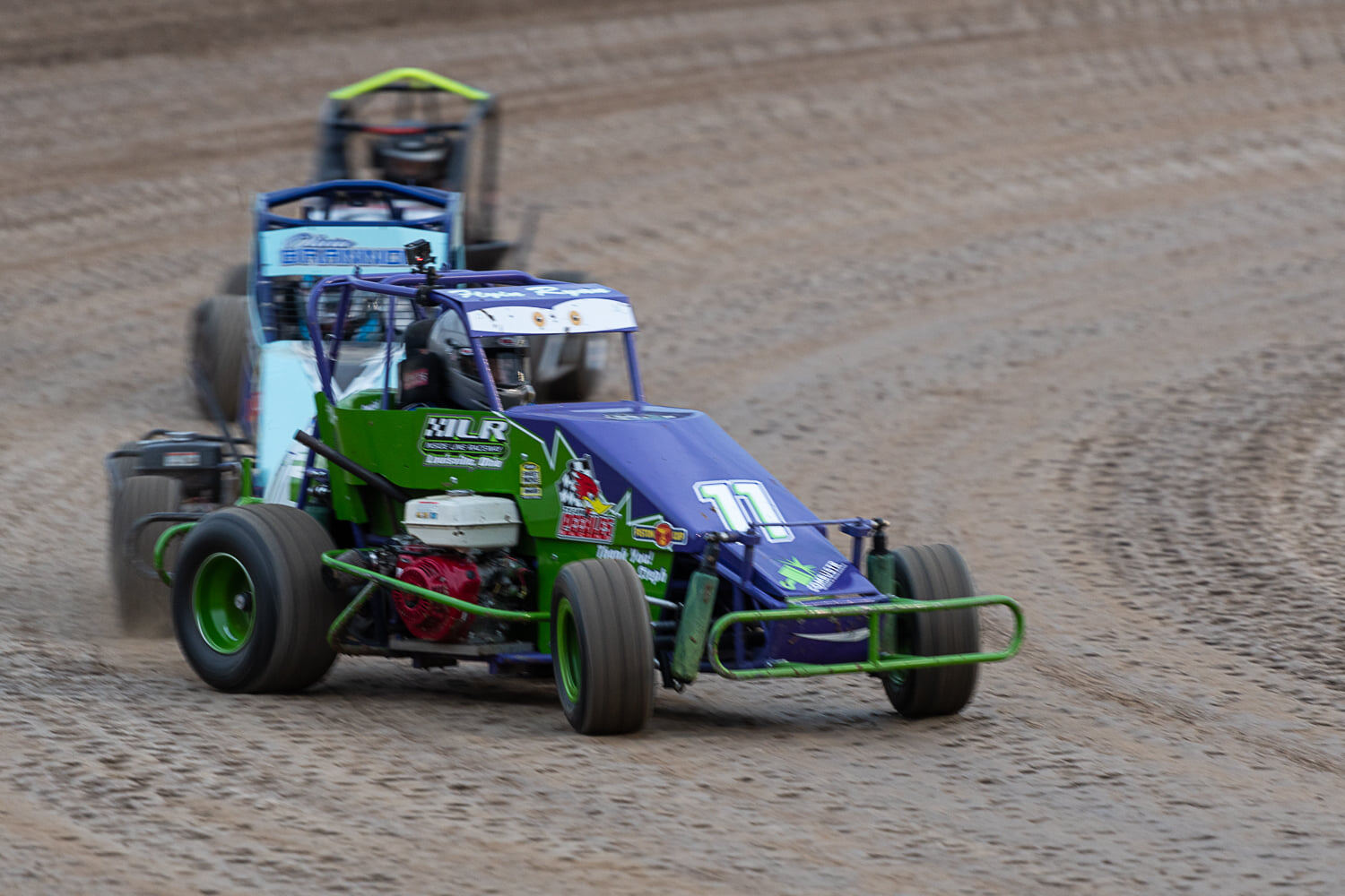 R&R Racing #11 EconoMod leading competitor through turn on Ohio dirt track