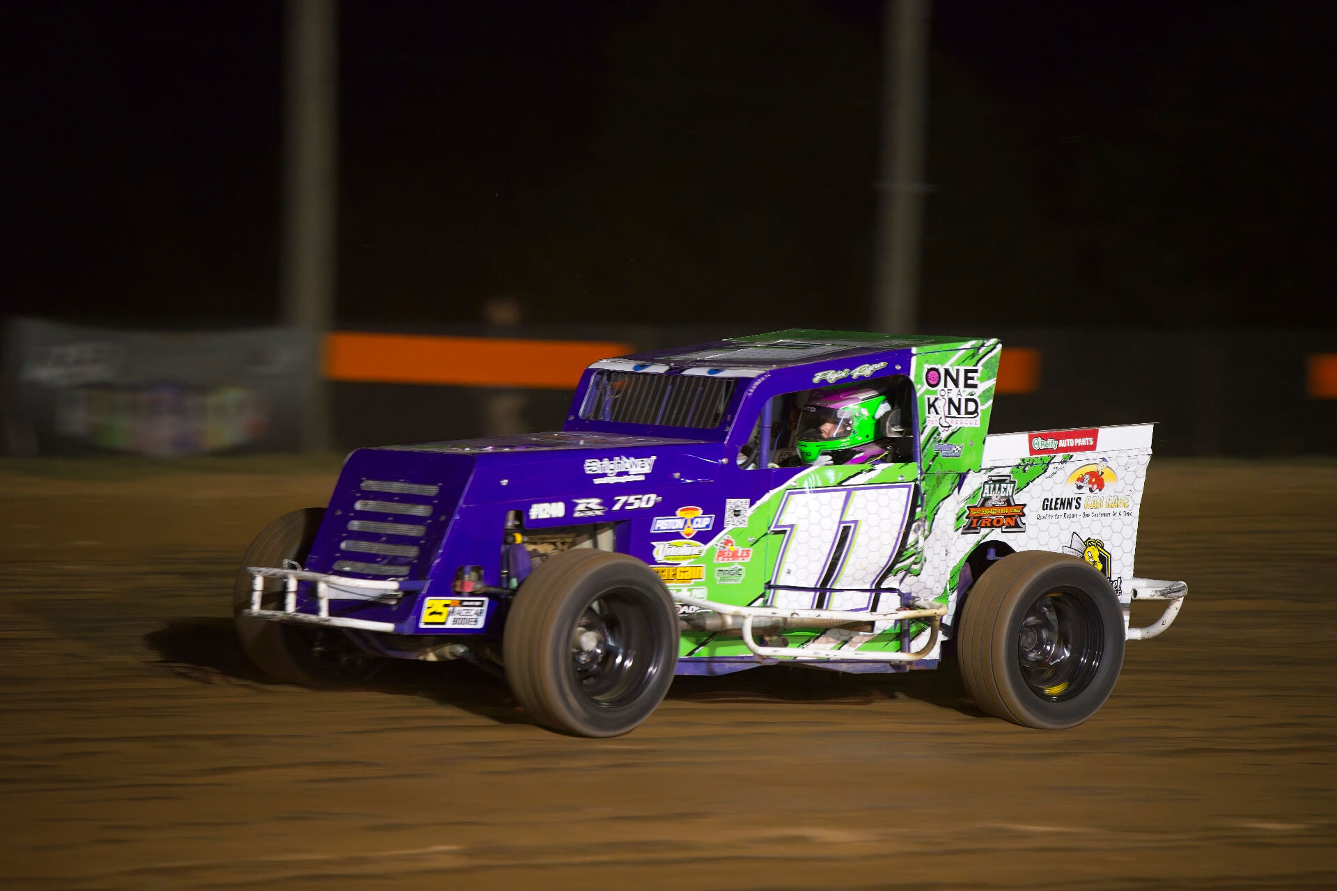 R&R Racing #11 purple and green EconoMod on dirt track with sponsor logos