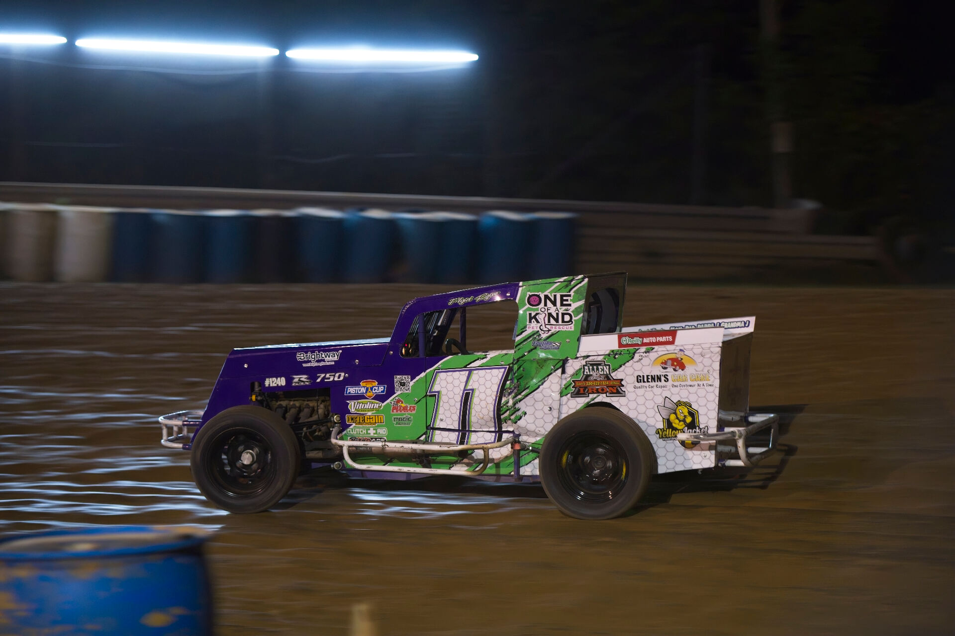 R&R Racing #11 EconoMod side profile under track lights on Ohio dirt oval